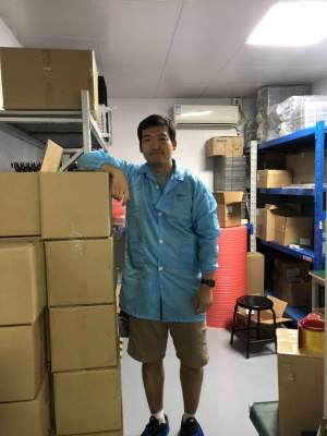 Donny from Sandnwave standing next to boxes