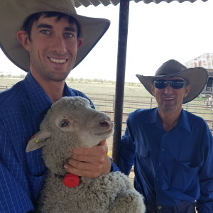 SmartShepherd happy customers holding lamb