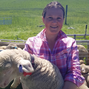 SmartShepherd happy customer holding lamb